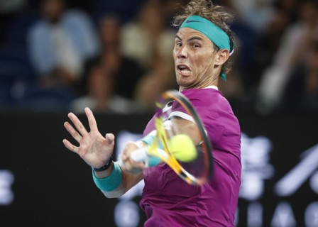 Spanish tennis player Rafael Nadal during the forehand stroke at the Australian Open 2022 Tournament at Melbourne Park
