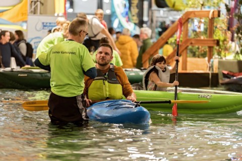 Man paddling in a canoe