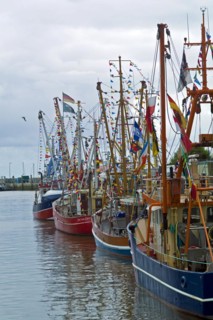 Decorated crab cutter in the harbour of Neuharlingersiel