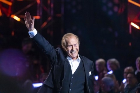 Singer Michael Holm performing on stage. 50 years of ZDF Hitparade