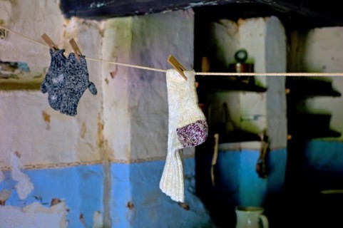Socks and gloves on a clothesline