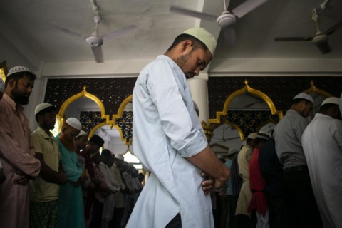 Indian Muslims perform the second Friday prayer in the holy month of Ramadan at a Mosque in Guwahati