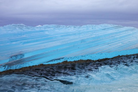 Blue ice abstract close-up of the Negribreen glacier at Spitsbergen