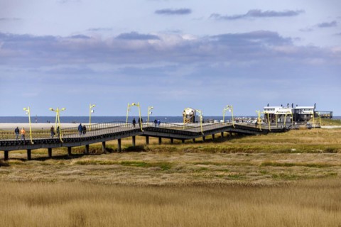 Pier to the typical pile dwellings of Sankt Peter-Ording