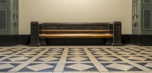 Wooden bench in retro style in the vestibule of Spandau Town Hall