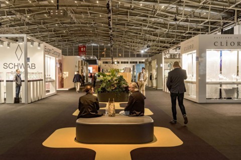 Walkway in exhibition hall with visitors