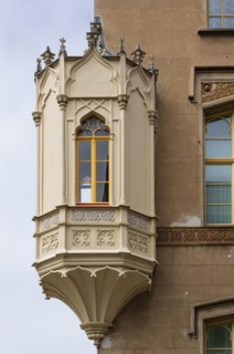 Neo-Gothic corner oriel on a historic building on the market square Neustrelitz