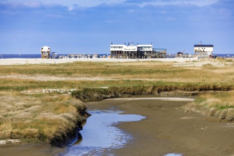 Sankt Peter-Ording beach with the typical pile dwellings