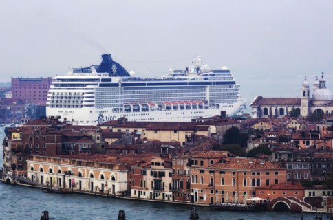 The cruise ship MSC Musica of the shipping company MSC Cruises sails to the cruise terminal Stazione Marittima. Meanwhile