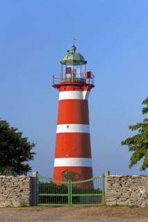 The red and white lighthouse Naers fyr at Naersholmen on the island Gotland