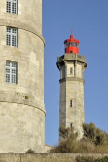 The old Tour Vauban and the new lighthouse Phare des Baleines on the island Ile de Re