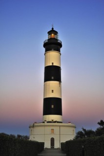 The lighthouse phare de Chassiron at sunset near Saint-Denis-dOleron on the island Ile dOleron