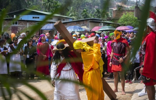 Christian devotees during the annual Good Friday procession to re-enact the crucifixion of Jesus Christ on April 7