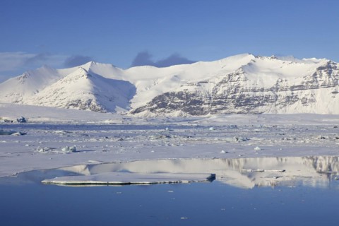Drift ice floating in Joekulsarlon glacier lagoon in winter