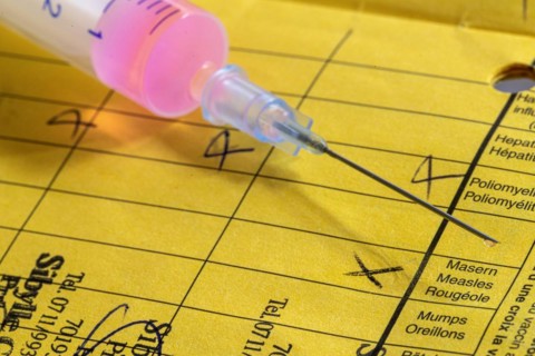 Vaccination certificate with syringe