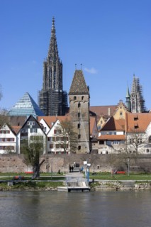 Danube and Danube promenade with Ulm city wall and Ulm Cathedral behind