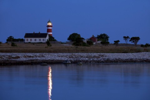 The red and white lighthouse Naers fyr at Naersholmen on the island Gotland
