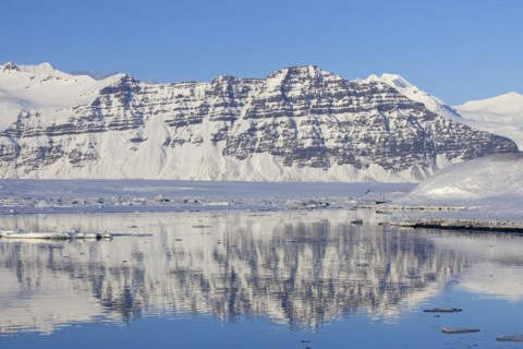 Snow covered mountains along the Joekulsarlon glacier lagoon in winter