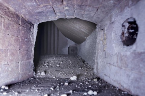 View into the boiler room of an industrial boiler of a former paper factory
