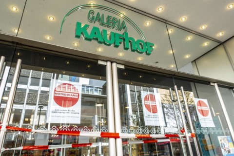 Closed entrance doors of a Galeria Kaufhof shop that is about to close