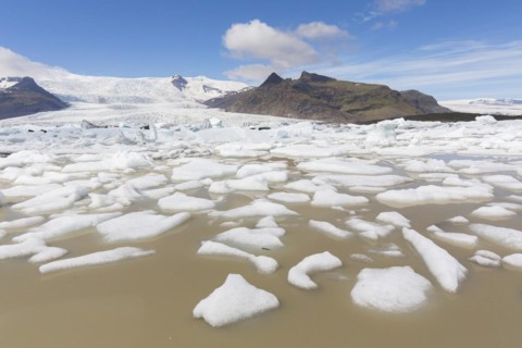 View over the glacier lake Fjallsarlon and Icelandic glacier Fjallsjoekull