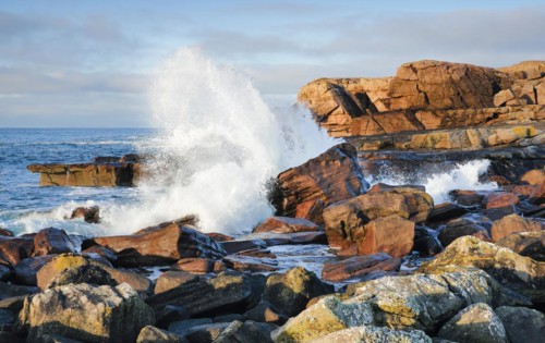 Water dashing against rocks on the rocky coast of Isle of Skye