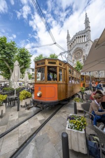 Historical tramway Tren de Soller and church Parroquia de Sant Bartomeu de Soller