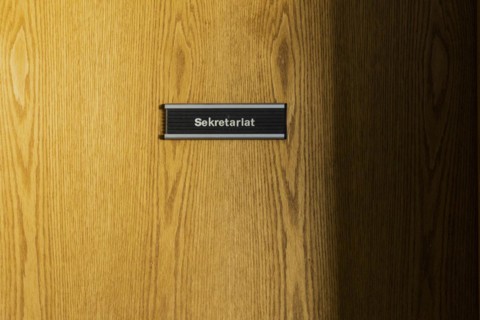 A sign saying secretary's office hangs on a door in the old primary school in Trinwillershagen