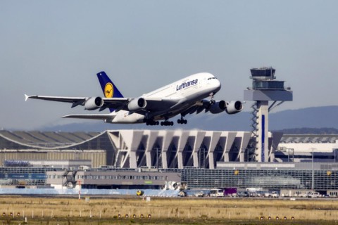 Airbus A380-800 of the airline Lufthansa taking off at Fraport Airport