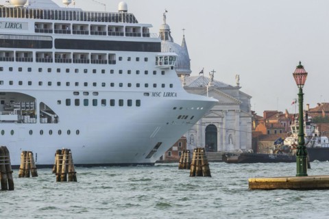 A cruise ship is heading for the Stazione Marittima cruise terminal. Meanwhile