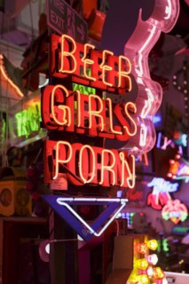 Room full of bright colourful neon signs