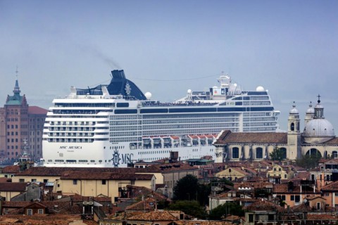The cruise ship MSC Musica of the shipping company MSC Cruises sails to the cruise terminal Stazione Marittima. Meanwhile