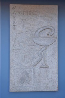 Emblem of the pharmacy and historical pharmacy with inscription