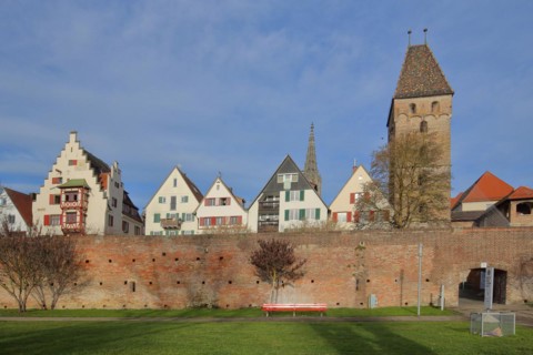 Historic city wall with butcher's tower and spire of the cathedral in front of the fishermen's quarter