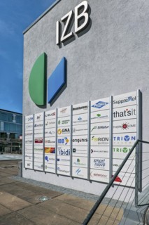 Information board with logos at the development company IZB mbH