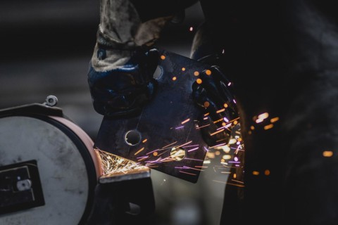 A piece of metal being ground