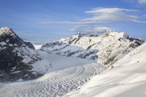 View over the mountains in winter surrounding the Swiss Aletsch Glacier