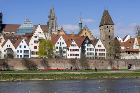 Danube and Danube promenade with Ulm city wall and Ulm Cathedral behind