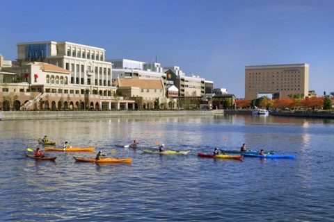 Group of kayaks on excursion in Minato Mirai 21 MM Yokohama city Kanagawa Japan