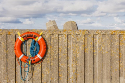 Lifebelt on concrete wall