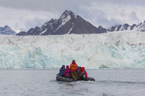 Eco-tourists watching Fjortende Julibreen
