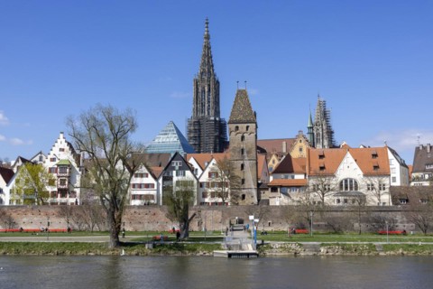 Danube and Danube promenade with Ulm city wall and Ulm Cathedral behind