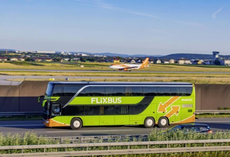 Flixbus on the road on the A8 motorway at the airport