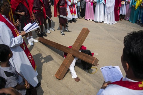 Christian devotees during the annual Good Friday procession to re-enact the crucifixion of Jesus Christ on April 7