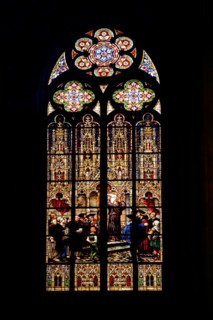Stained glass window with Martin Luther's posting of 95 theses at the castle church in Wittenberg