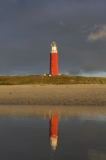Eierland Lighthouse in the dunes during stormy weather on the northernmost tip of the Dutch island of Texel