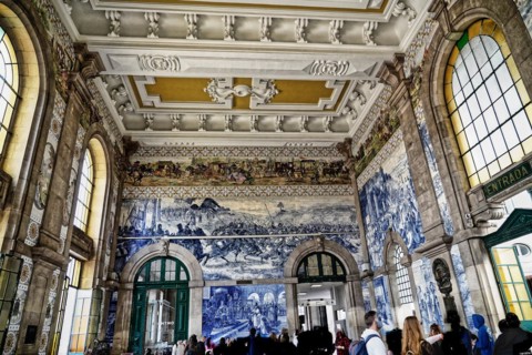 View of azulejos on walls of ornate interior of Arrivals Hall at Sao Bento Railway Station in Porto