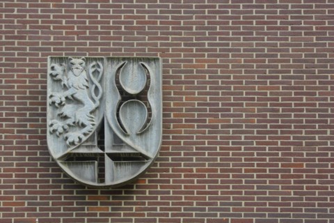 Town coat of arms on the town hall