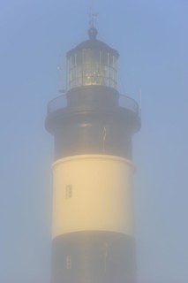The lighthouse phare de Chassiron in the mist at Saint-Denis-dOleron on the island Ile dOleron