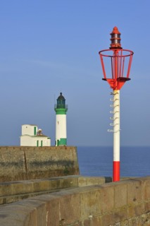 Lighthouse and marine beacon on jetty at Le Treport